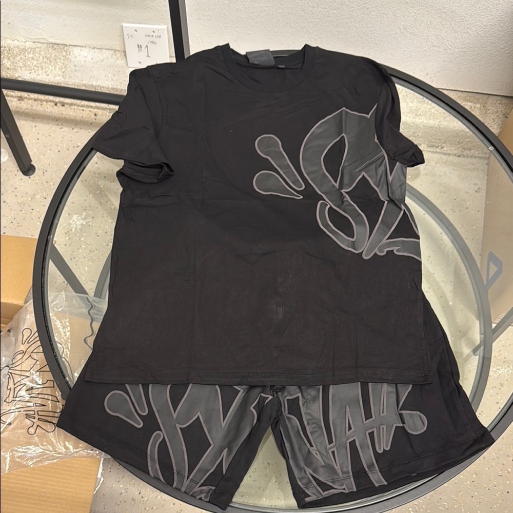 Syna Set, new in bag. Shirt has mark in photo, may come out in wash
